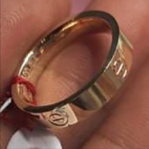 18 Saudi gold . With stamp Cartier logo and 750